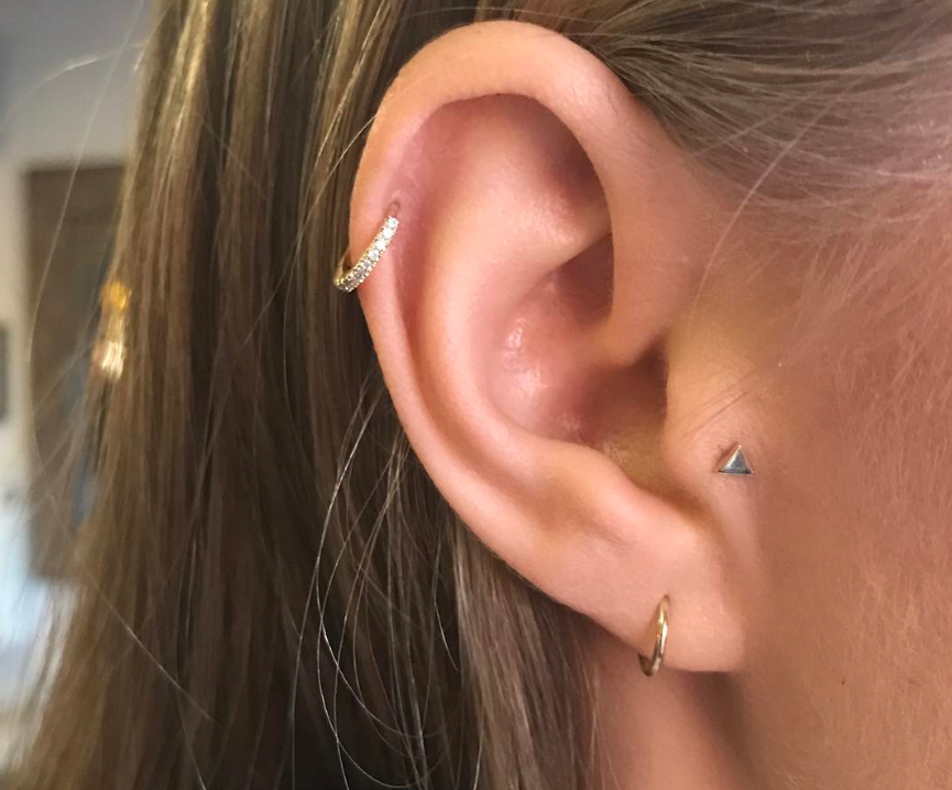 Helix Piercing Information & things about the trend