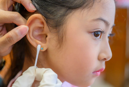 Should you rotate freshly pierced earrings or not?