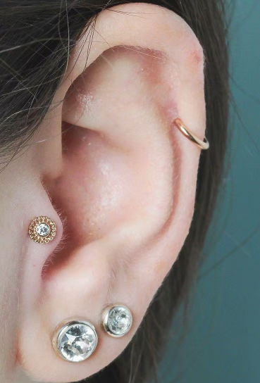 Sleeping with a new ear piercing: risks and solutions